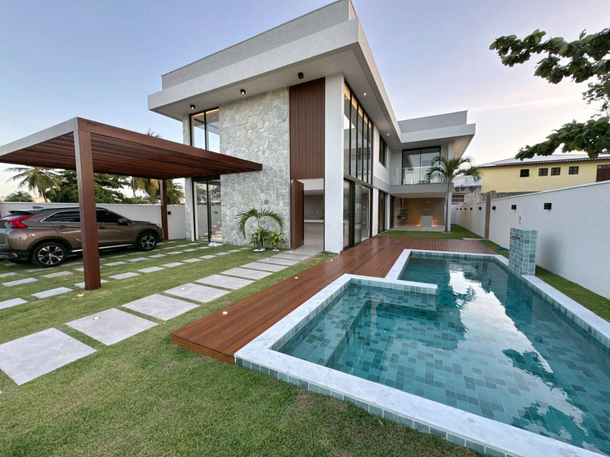 Casa Guarajuba 8 suítes Cond. Paraíso Reg. Praia Forte Estrada do Coco Linha Verde - Iuri Imóveis