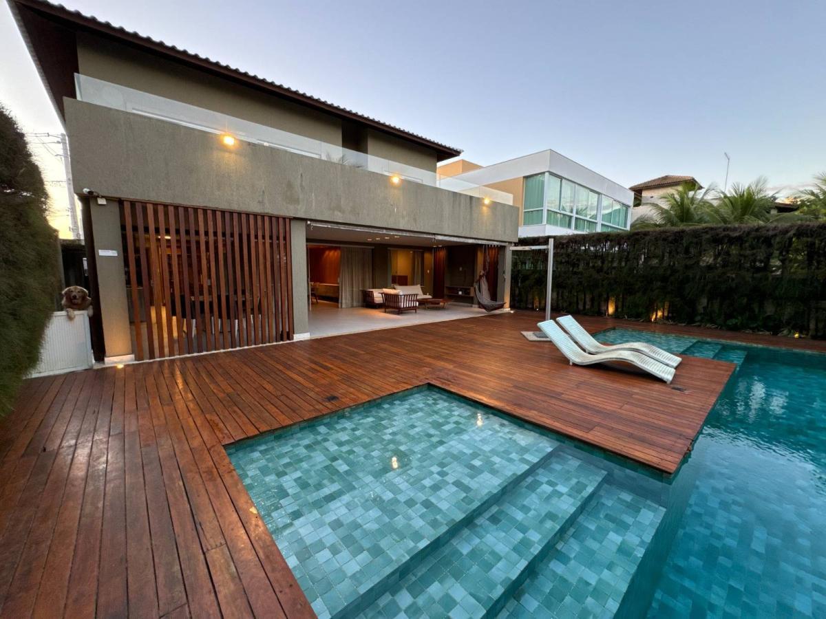 Casa Guarajuba Frente Mar 5 suítes Reg Praia Forte Estrada do Coco Linha Verde Paraíso - Iuri Imóveis